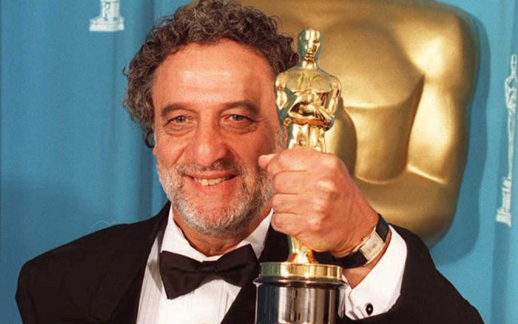 Enrique Bacalov from Argentina holds his Oscar for